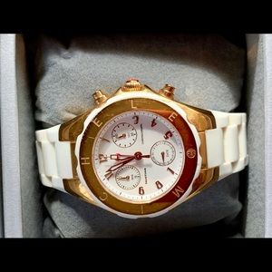 Michele white band watch with gold tone face